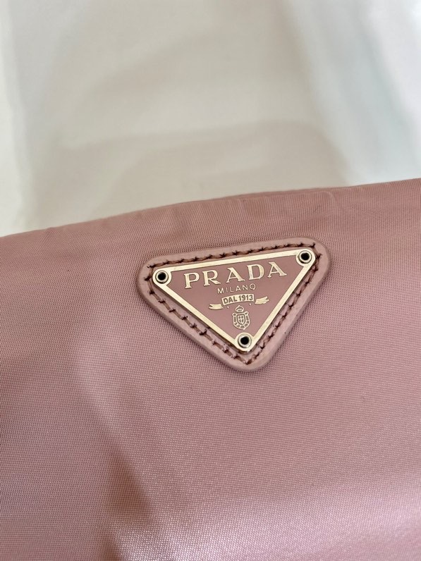 Pra*a clutch bags